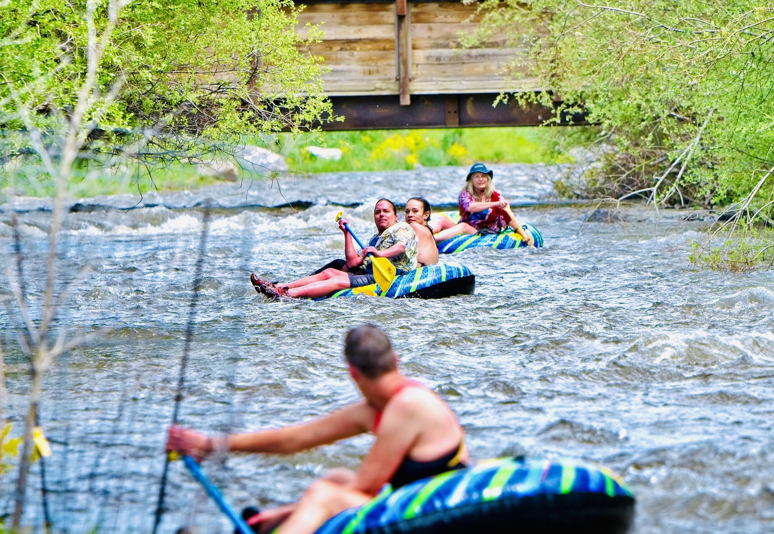 Tubing/rafting down rapids/river